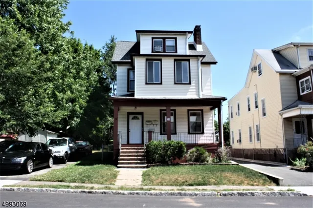 a front view of multiple houses
