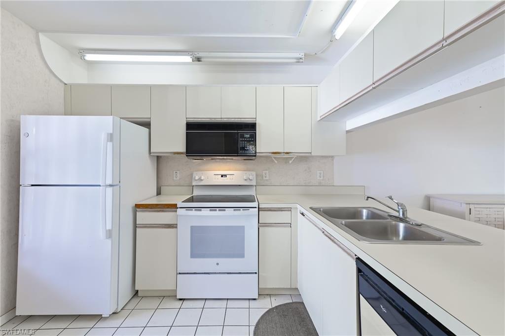 1965 Courtyard Way, Unit E206 Naples, FL 34112 - Photo 2 of 20