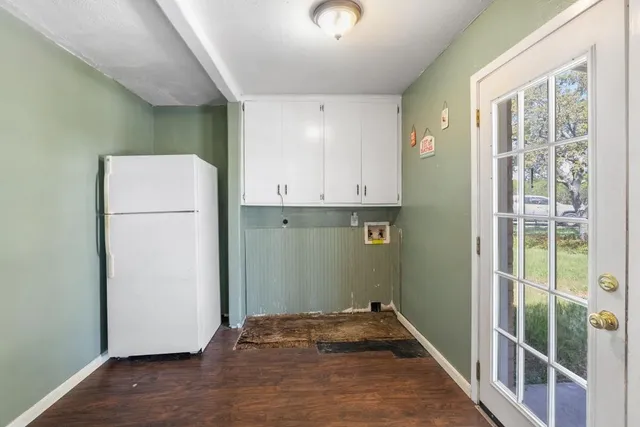 a bathroom with a granite countertop toilet a sink and bathtub