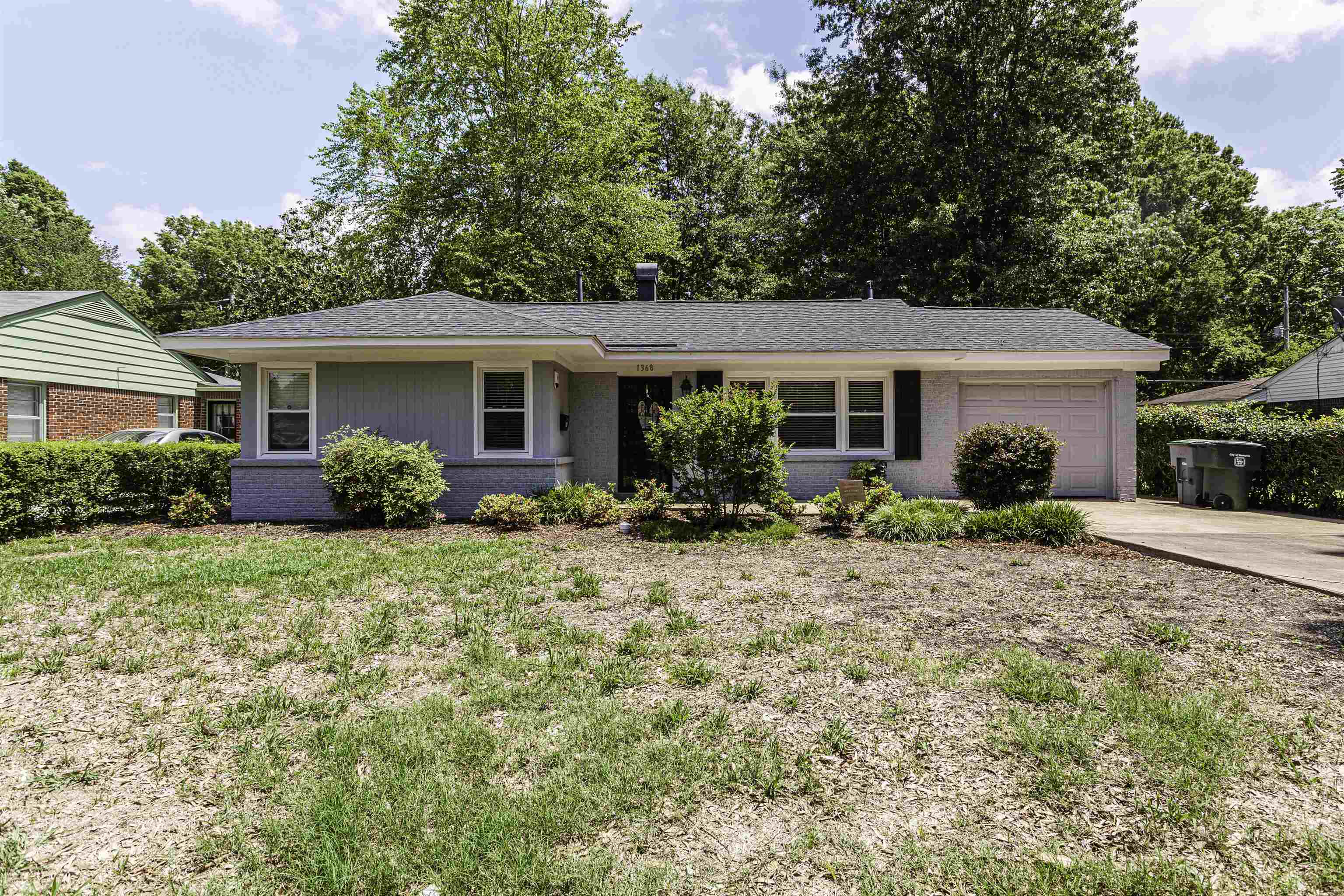 1368 Dearing Road Memphis, TN 38117 - Photo 1 of 19 a view of a house with backyard and garden