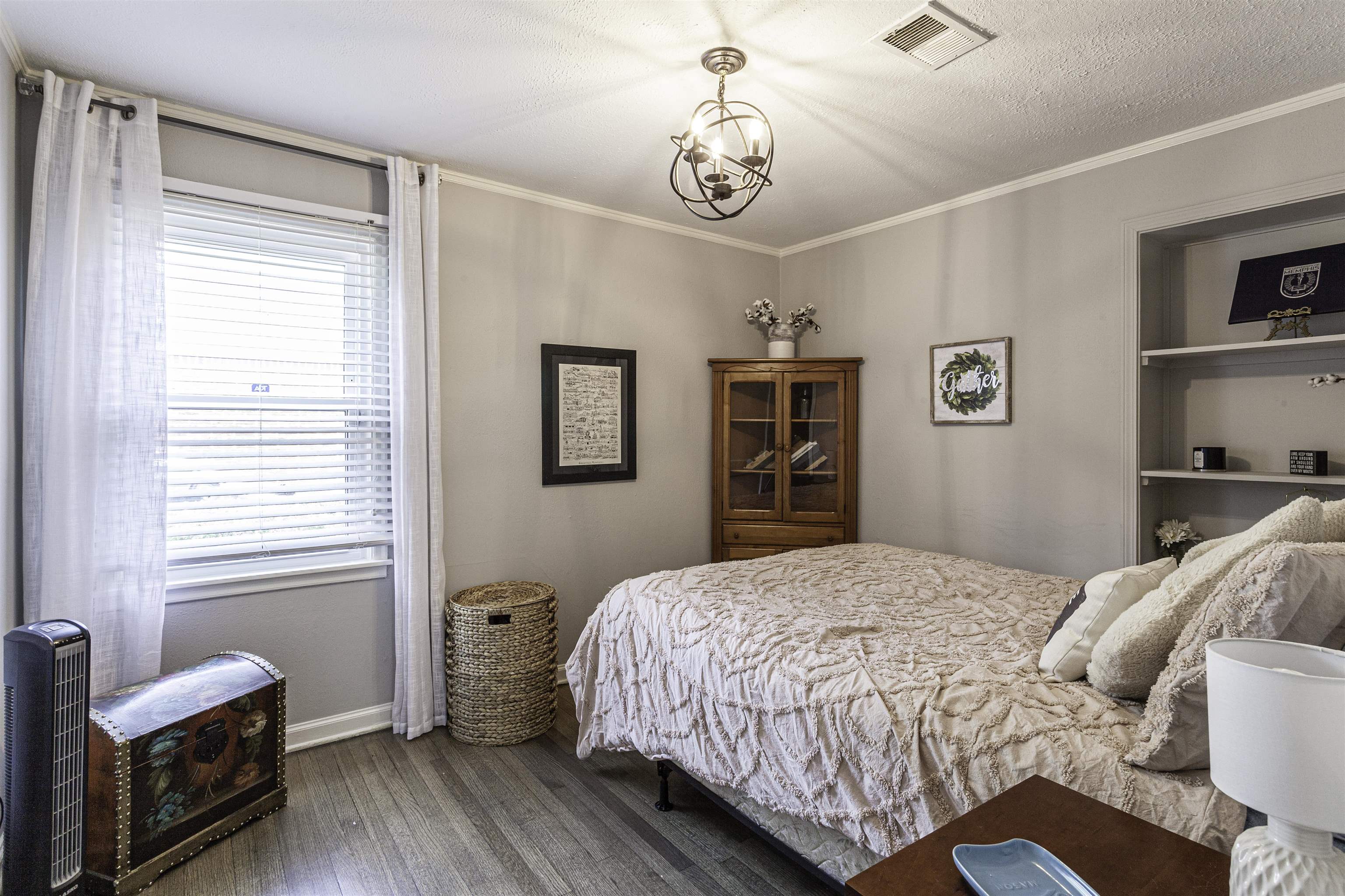1368 Dearing Road Memphis, TN 38117 - Photo 13 of 19 a bedroom with a bed and a window