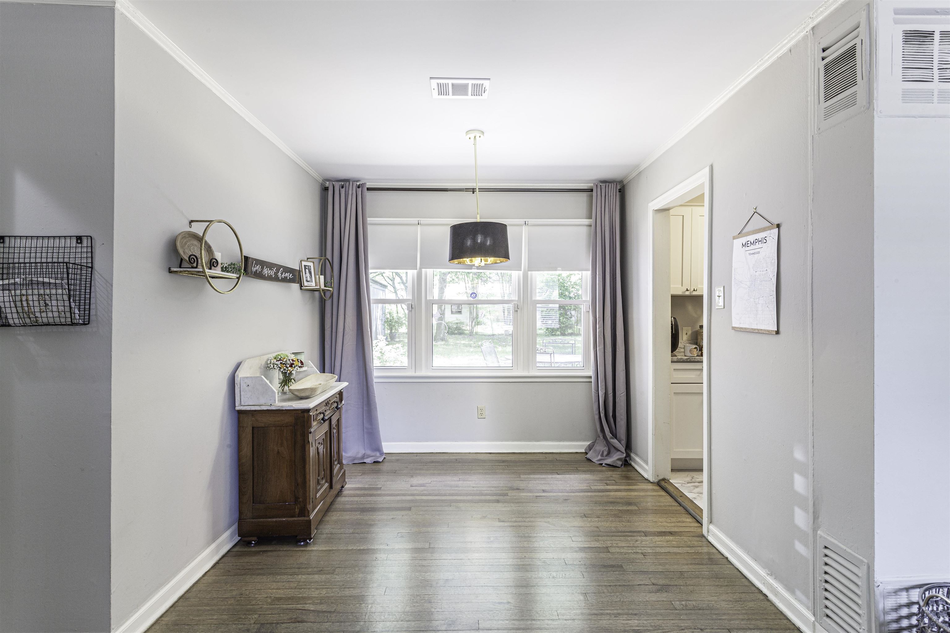 1368 Dearing Road Memphis, TN 38117 - Photo 6 of 19 a view of a livingroom with wooden floor and a window