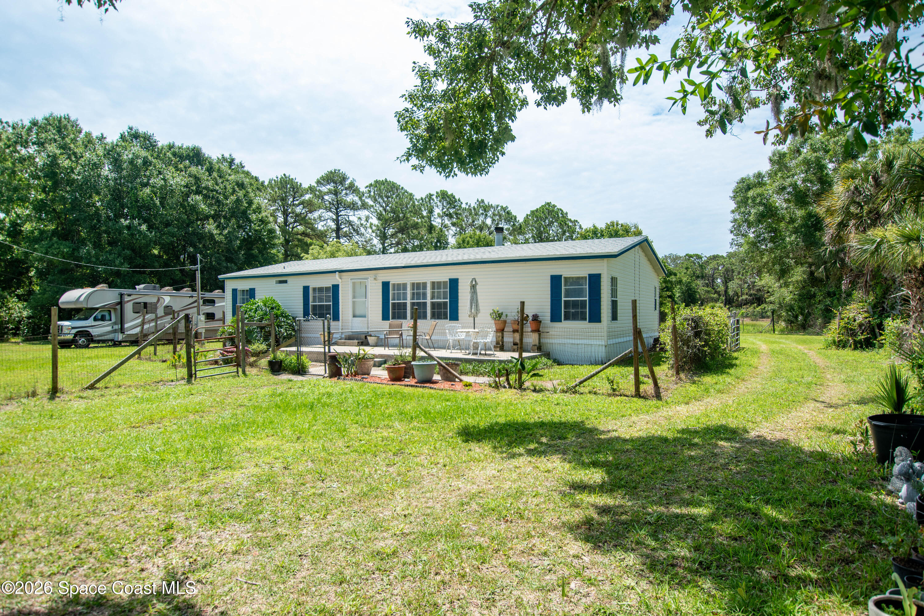 4785 Harrison Road Mims, FL 32754 - Photo 3 of 34 side elevation