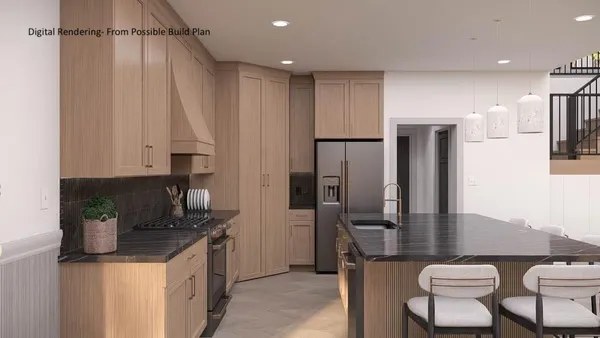 a kitchen with cabinets and chairs