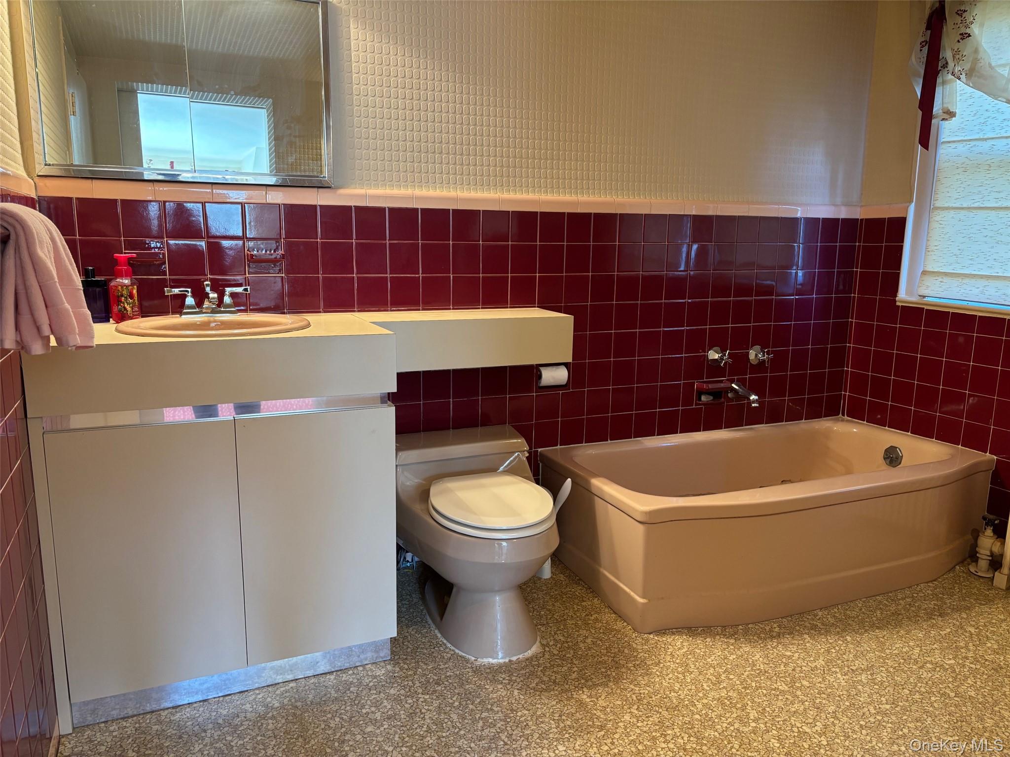 185 South Country Road, Unit S COUNTRY RD East Patchogue, NY 11772 - Photo 31 of 47 a bathroom with a sink a toilet and bathtub