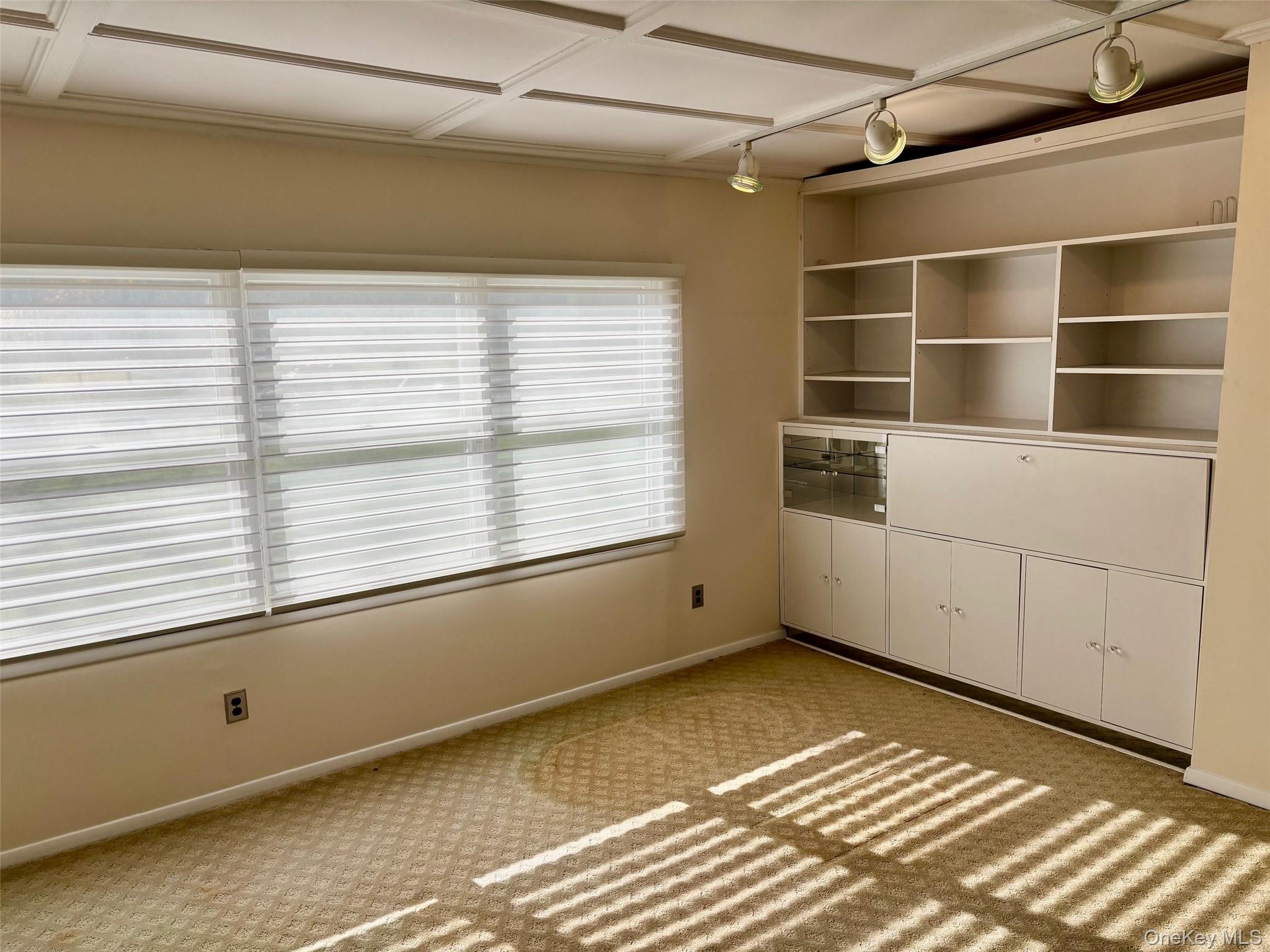 185 South Country Road, Unit S COUNTRY RD East Patchogue, NY 11772 - Photo 7 of 47 a view of an empty room with a window