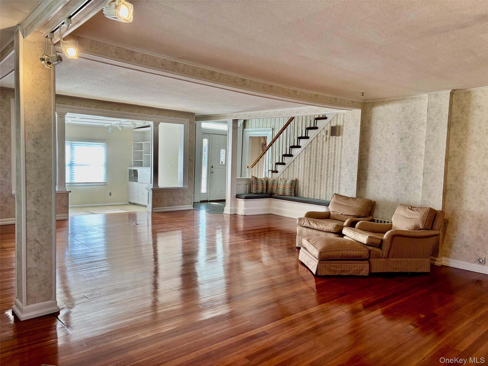 185 South Country Road, Unit S COUNTRY RD East Patchogue, NY 11772 - Photo 8 of 47 a living room with furniture and wooden floor