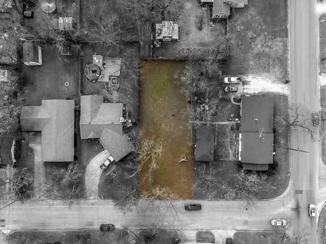 an aerial view of houses and roads