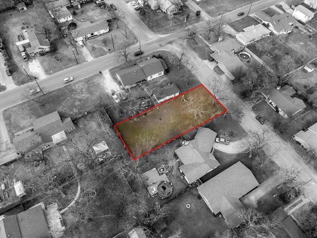 an aerial view of residential house with outdoor space