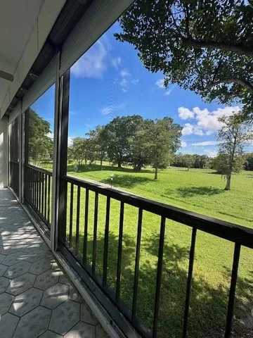 a view of swimming pool with lounge chair