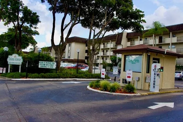 a kitchen with stainless steel appliances a refrigerator and a stove top oven