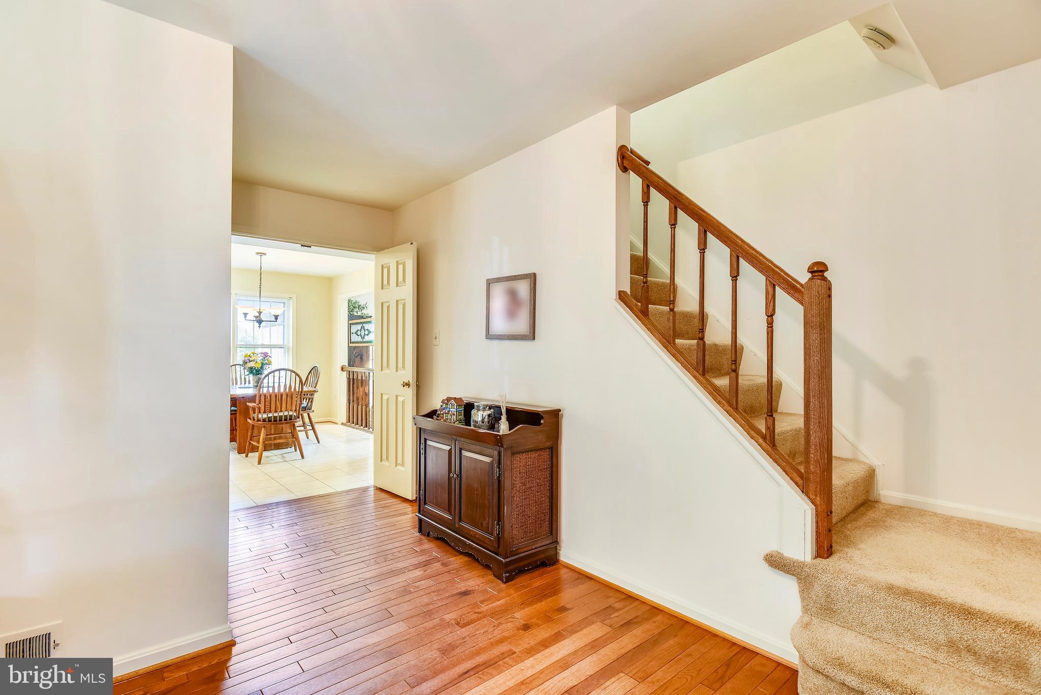 19 Rutledge Court Sterling, VA 20165 - Photo 10 of 36 HARDWOOD FLOORS IN FOYER
