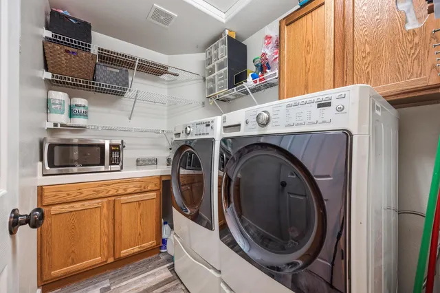 a utility room with dryer and washer