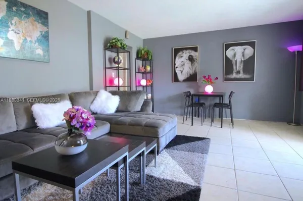 a view of livingroom with furniture and wooden floor