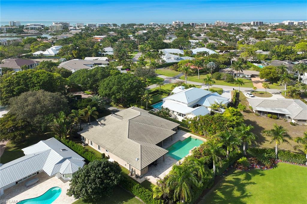 1900 Tiller Terrace Naples, FL 34102 - Photo 3 of 46 an aerial view of residential houses with outdoor space