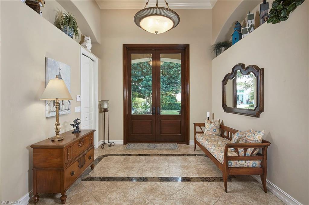 1900 Tiller Terrace Naples, FL 34102 - Photo 6 of 46 a living room with furniture and a window