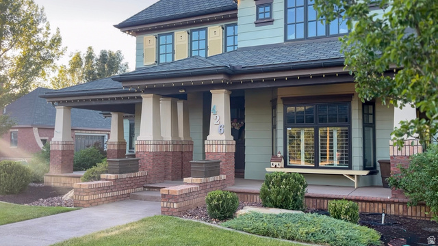 426 West Center Street Parowan, UT 84761 - Photo 105 of 107 Inviting covered front porch with brick column bases and a built-in bench