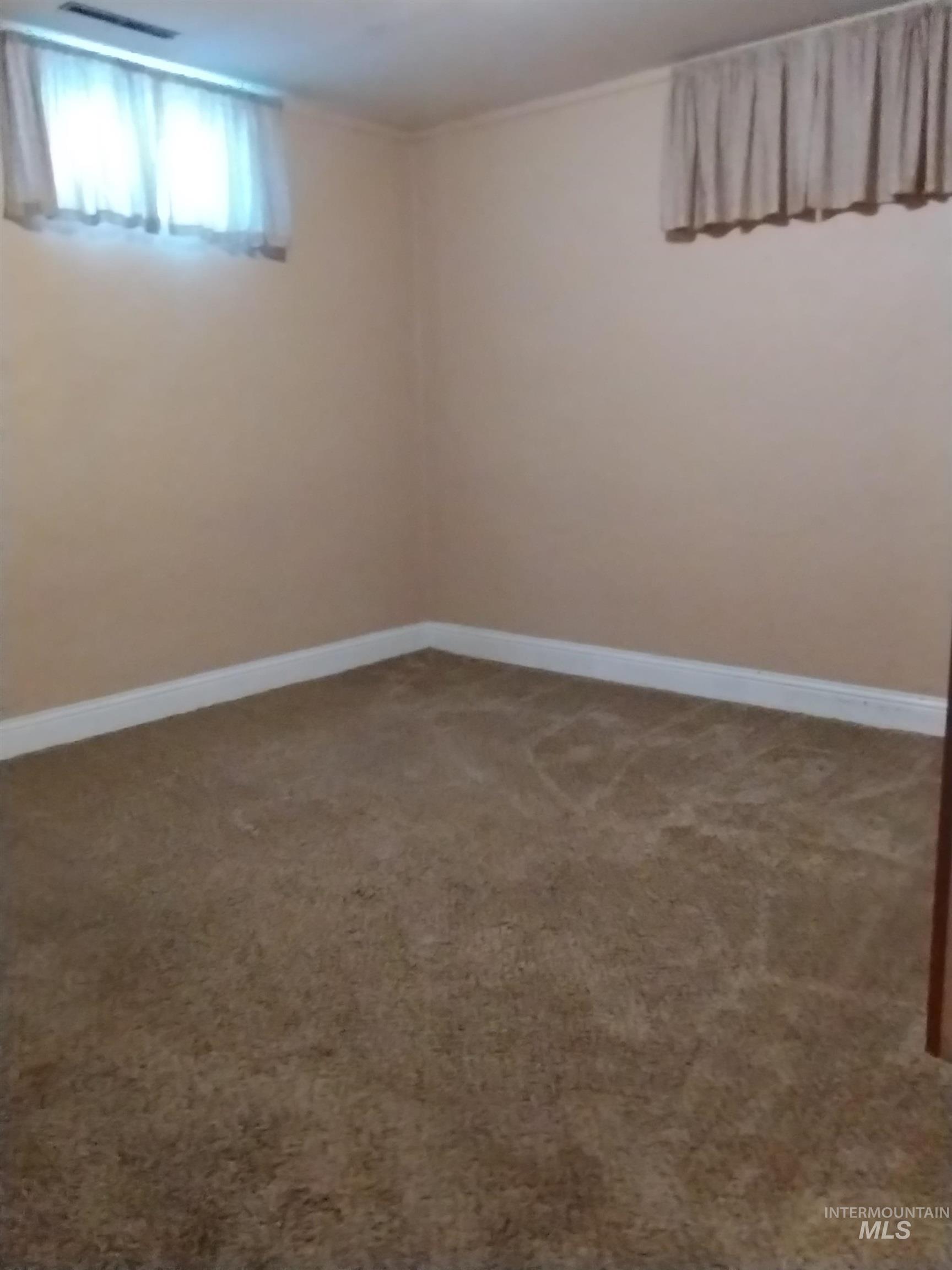 1298 East 2nd Street Weiser, ID 83672 - Photo 31 of 34 Downstairs Bedroom #2