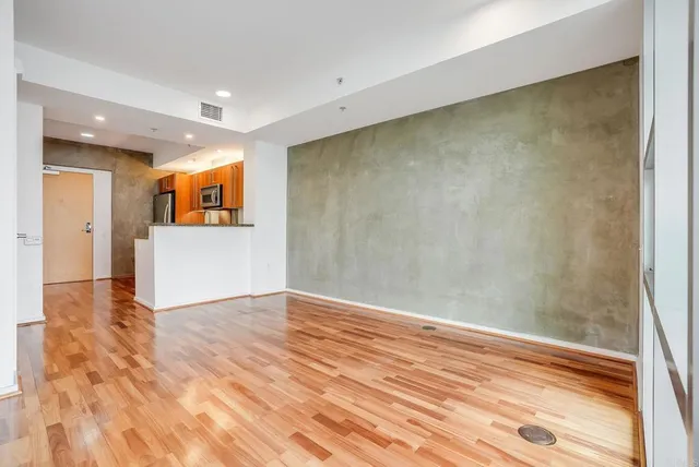 a view of livingroom with wooden floor
