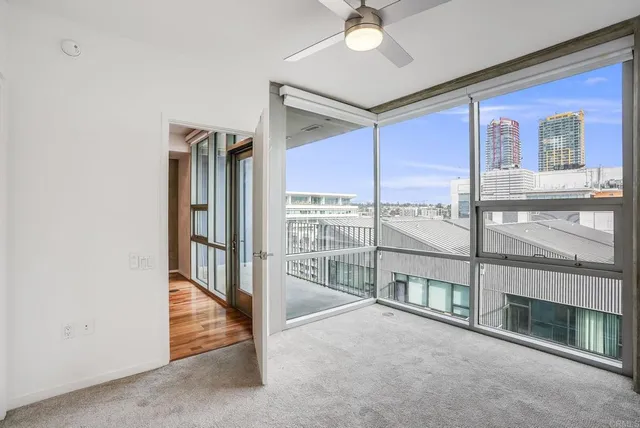 a view of an empty room with a window