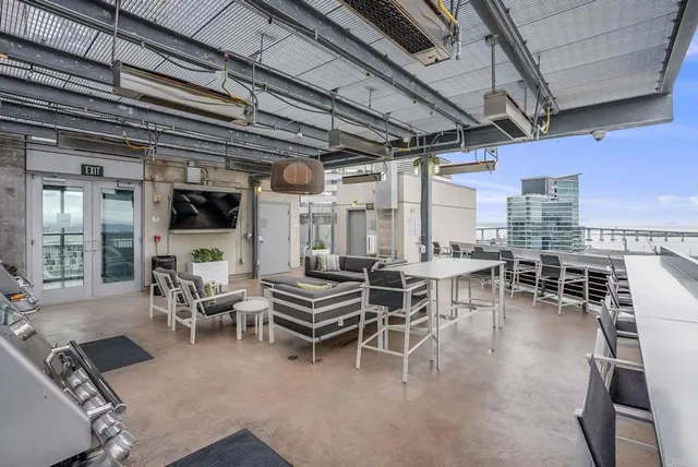 a view of a tall building with a lake view