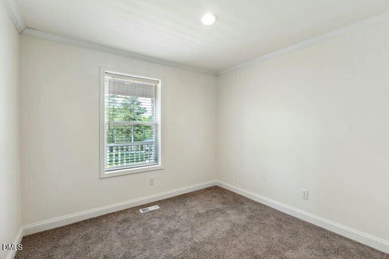 7120 Guess Road Hillsborough, NC 27278 - Photo 18 of 27 an empty room with a window