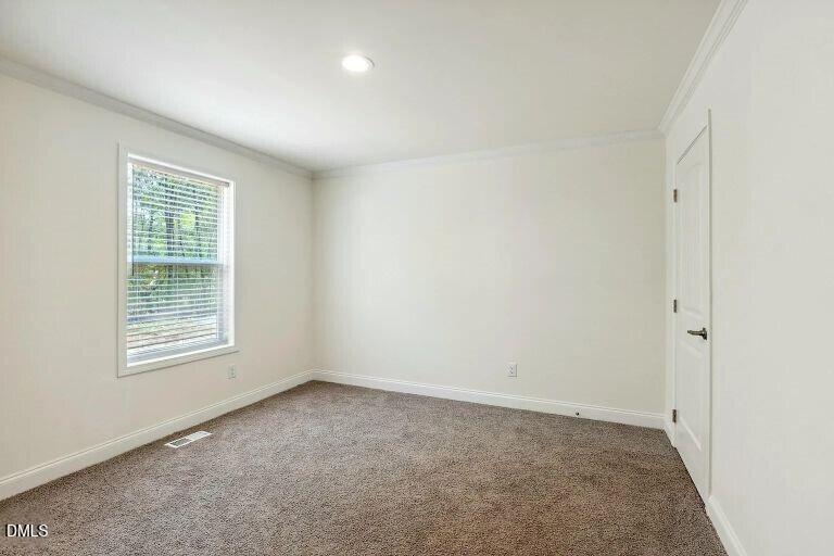 7120 Guess Road Hillsborough, NC 27278 - Photo 19 of 27 an empty room with a window