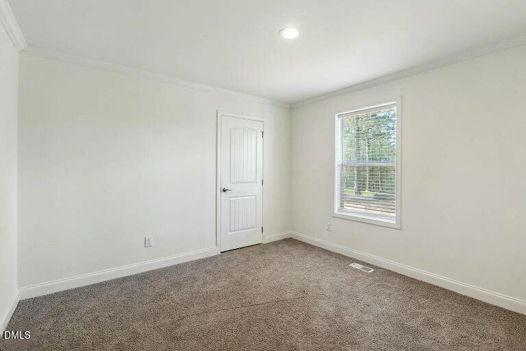 7120 Guess Road Hillsborough, NC 27278 - Photo 21 of 27 an empty room with a window