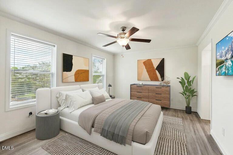 7120 Guess Road Hillsborough, NC 27278 - Photo 23 of 27 a bedroom with a large bed and a window