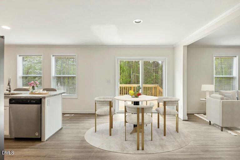 7120 Guess Road Hillsborough, NC 27278 - Photo 24 of 27 a view of a dining room with furniture window and outside view