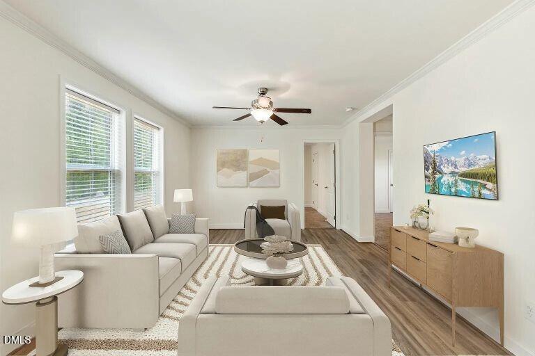 7120 Guess Road Hillsborough, NC 27278 - Photo 25 of 27 a living room with furniture and a large window