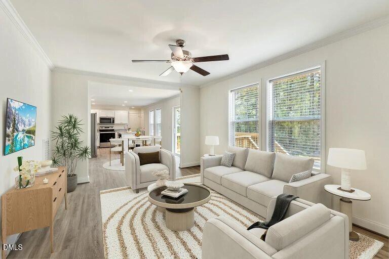 7120 Guess Road Hillsborough, NC 27278 - Photo 26 of 27 a living room with furniture and a large window