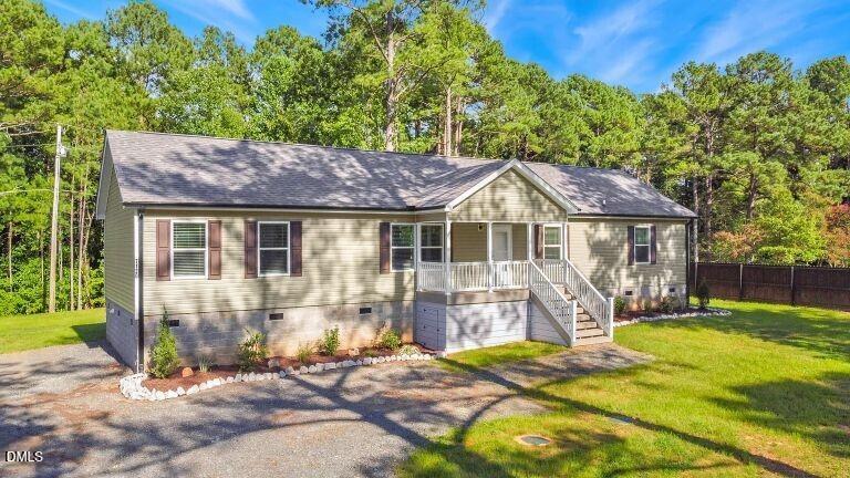 7120 Guess Road Hillsborough, NC 27278 - Photo 3 of 27 front view of house with a yard