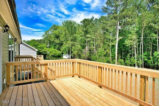 7120 Guess Road Hillsborough, NC 27278 - Photo 6 of 27 a view of a wooden deck