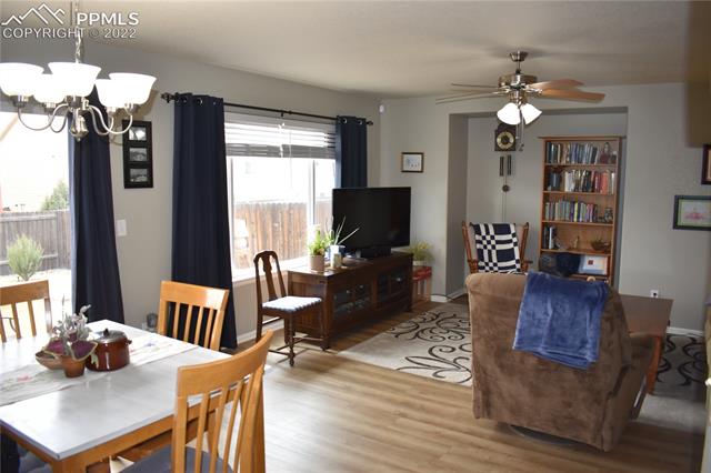 7325 Pearly Health Road Colorado Springs, CO 80908 - Photo 2 of 20 Dining Room & Family Room