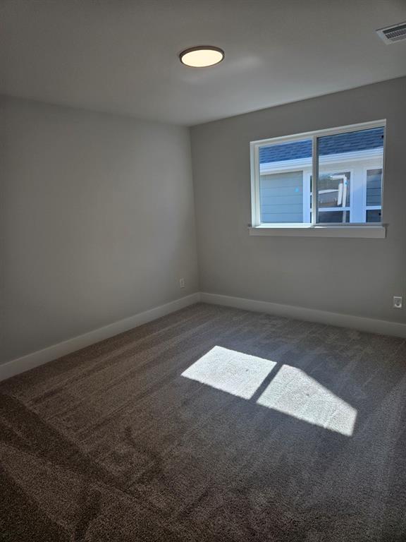 221 Chestnut Street Celina, TX 75009 - Photo 18 of 23 a view of an empty room with a window