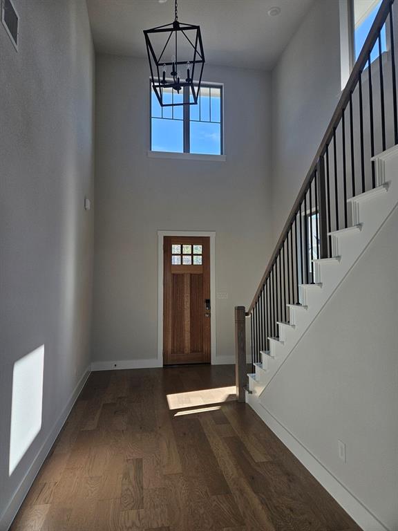 221 Chestnut Street Celina, TX 75009 - Photo 2 of 23 a view of an entryway with wooden floor