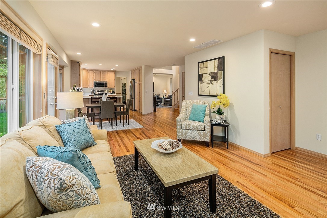 8515 Northeast 176th Street Bothell, WA 98011 - Photo 11 of 25 a living room with furniture and wooden floor