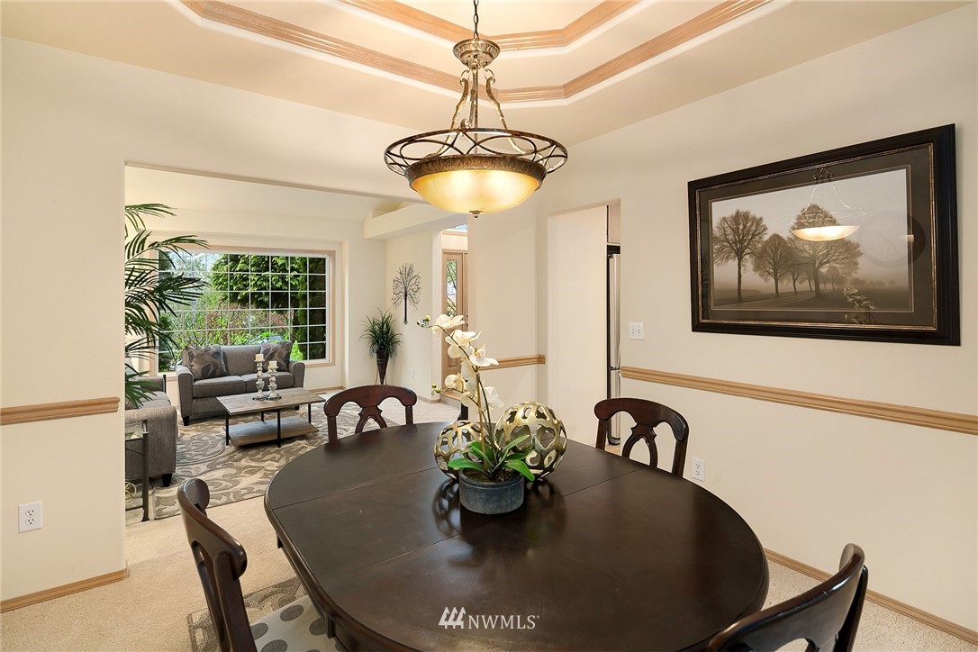 8515 Northeast 176th Street Bothell, WA 98011 - Photo 15 of 25 a dining room with furniture and window