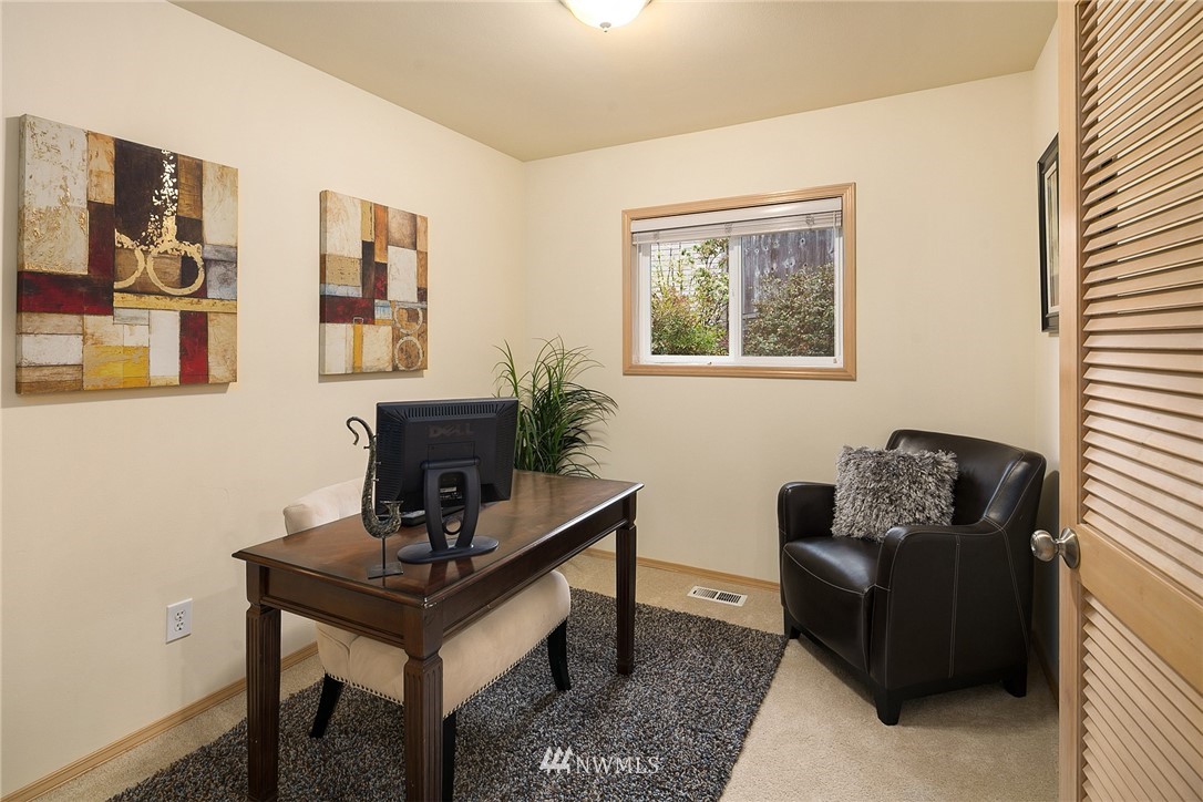 8515 Northeast 176th Street Bothell, WA 98011 - Photo 17 of 25 a living room with furniture and a potted plant