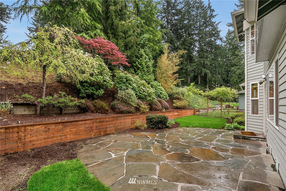 8515 Northeast 176th Street Bothell, WA 98011 - Photo 23 of 25 a view of a yard with potted plants