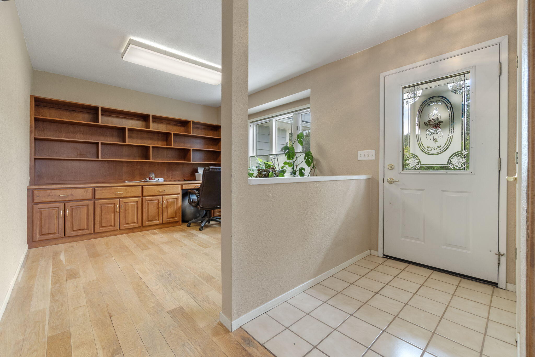 17722 Pope Road Merrill, OR 97633 - Photo 11 of 61 a view of an empty room with cabinet and a window