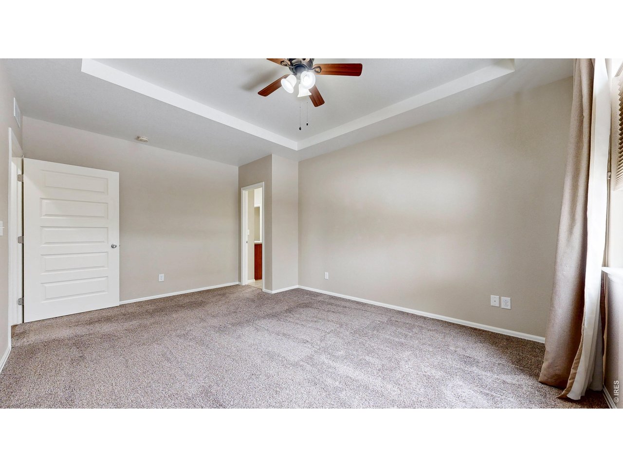 5543 Calgary Street Timnath, CO 80547 - Photo 11 of 39 Primary Bedroom (Main Level)