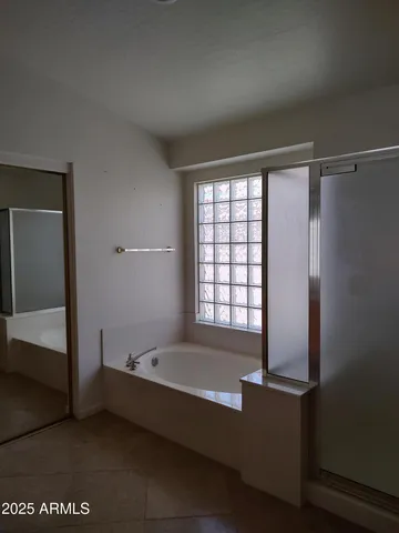 a bath room with a bed