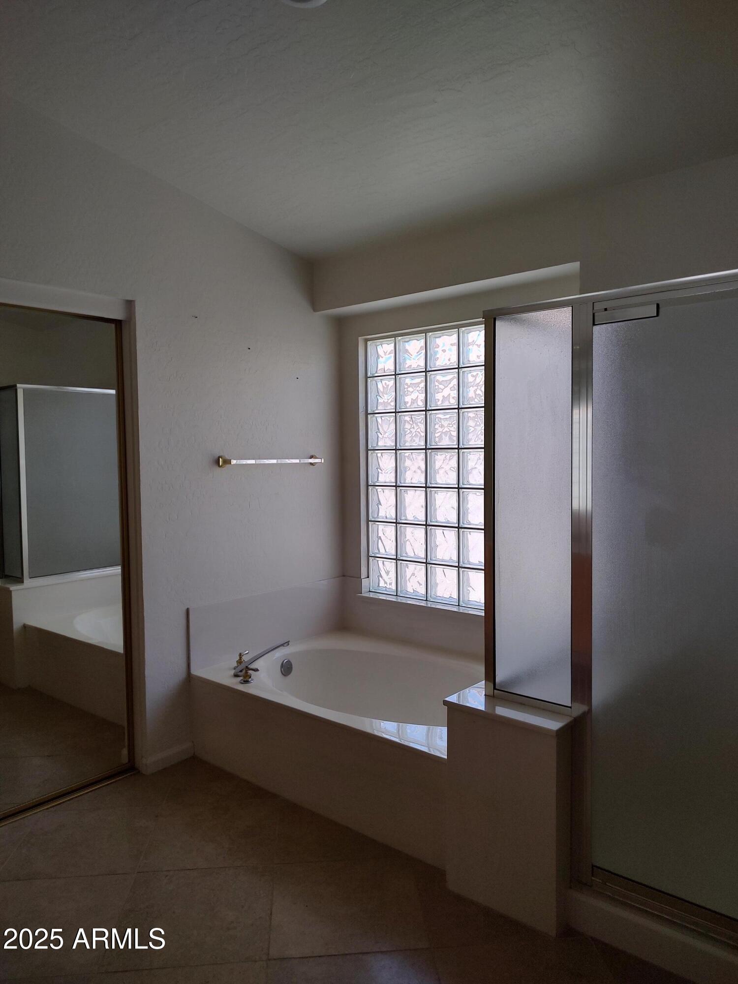 1365 West Courtney Lane Tempe, AZ 85284 - Photo 19 of 24 a bath room with a bed