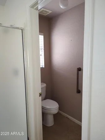 a bathroom with a toilet