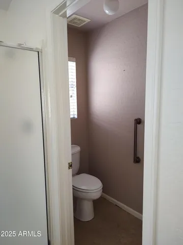 a bathroom with a toilet