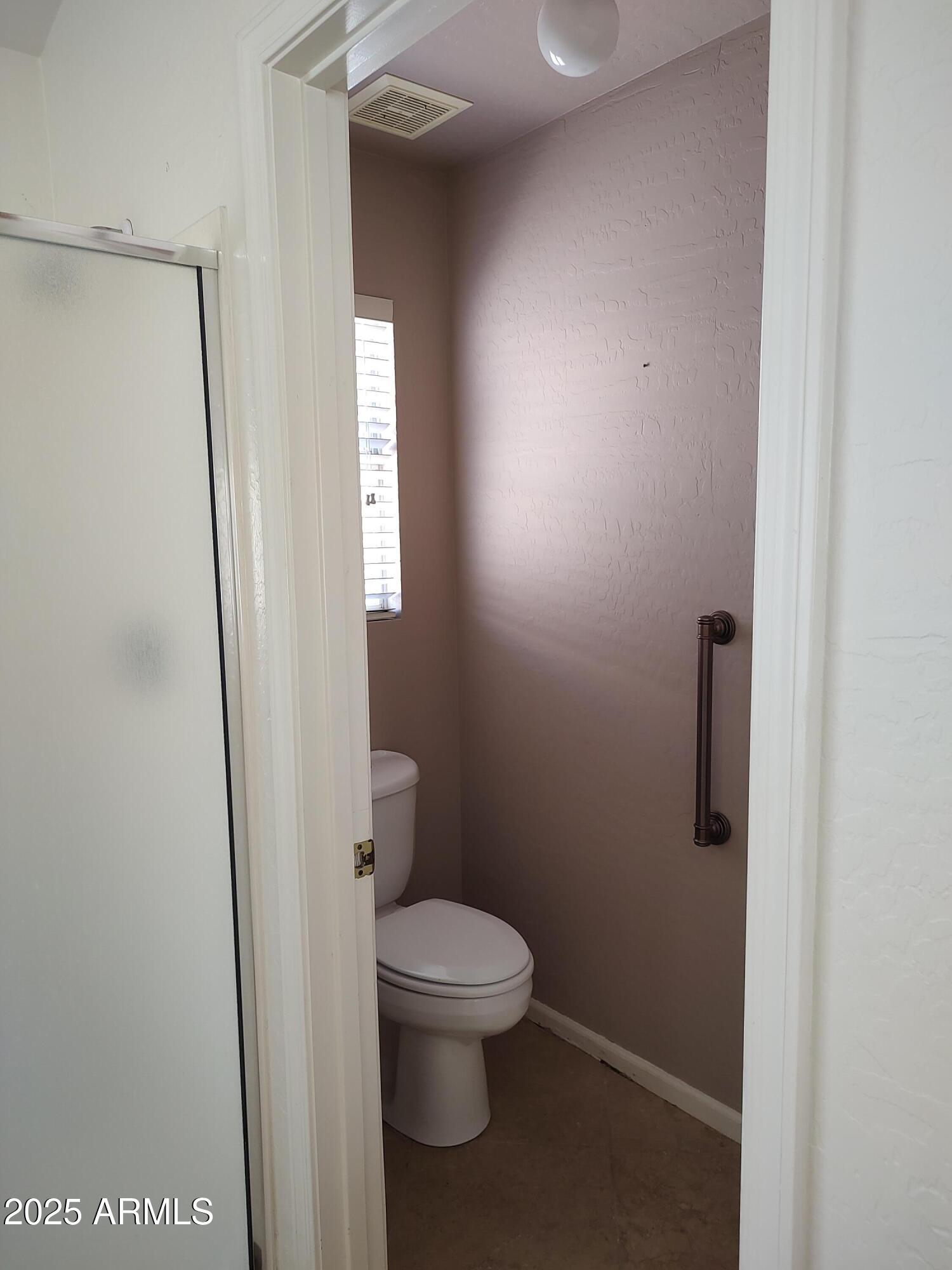 1365 West Courtney Lane Tempe, AZ 85284 - Photo 20 of 24 a bathroom with a toilet