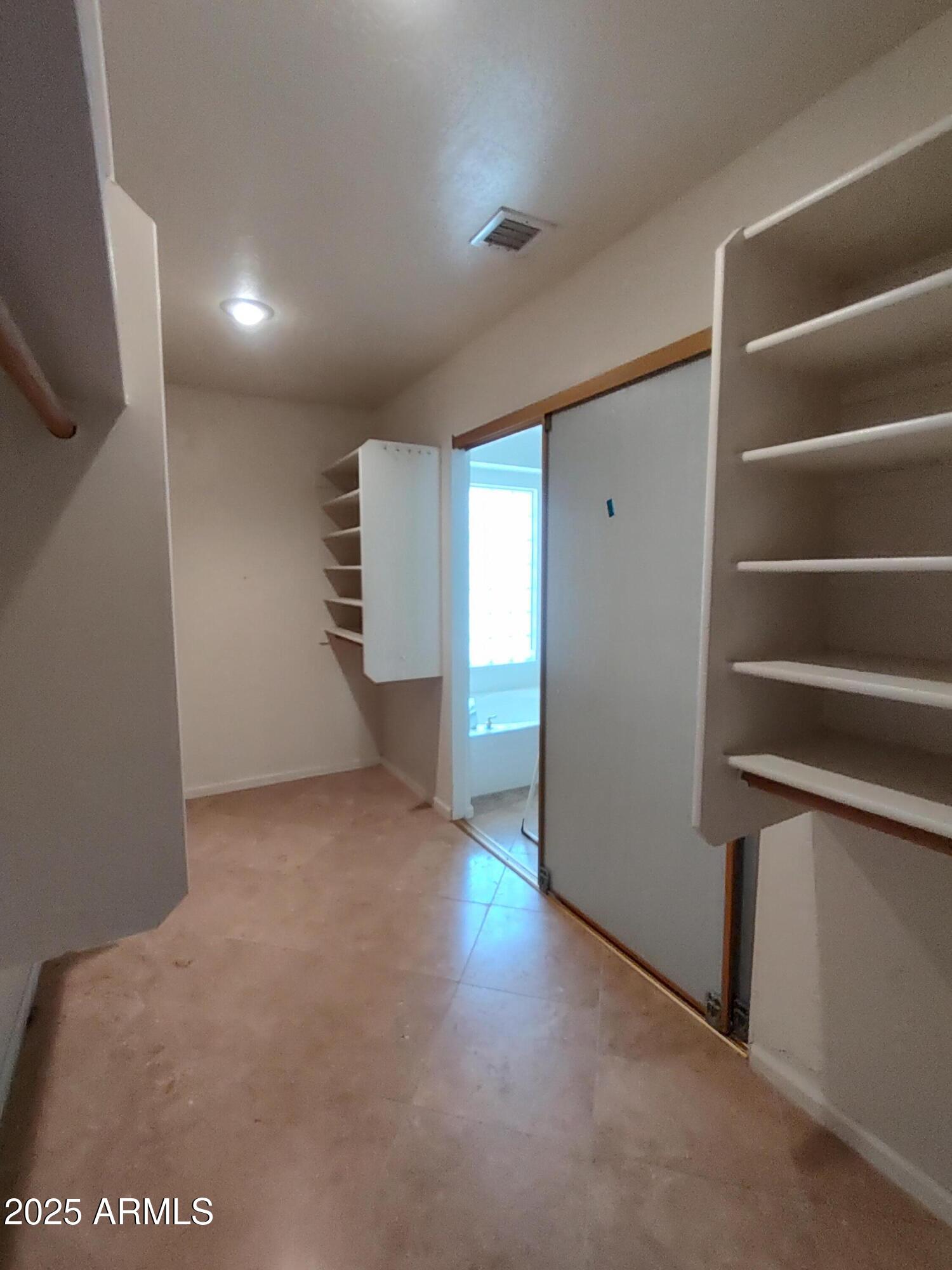1365 West Courtney Lane Tempe, AZ 85284 - Photo 21 of 24 a view of an empty room with a window