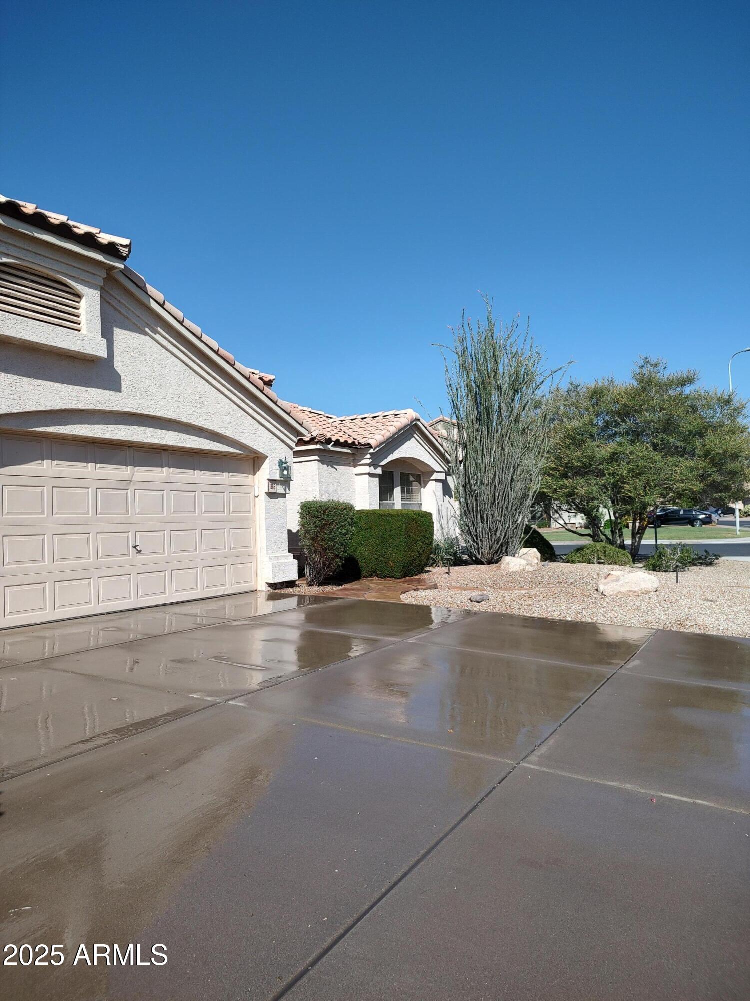 1365 West Courtney Lane Tempe, AZ 85284 - Photo 3 of 24 a view of a house with a yard